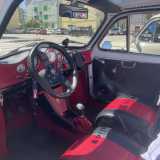 Mentre gli interni sono stati rivisitati con uno stile racing in rosso e nero che le danno l'aria di una piccola auto da corsa 
